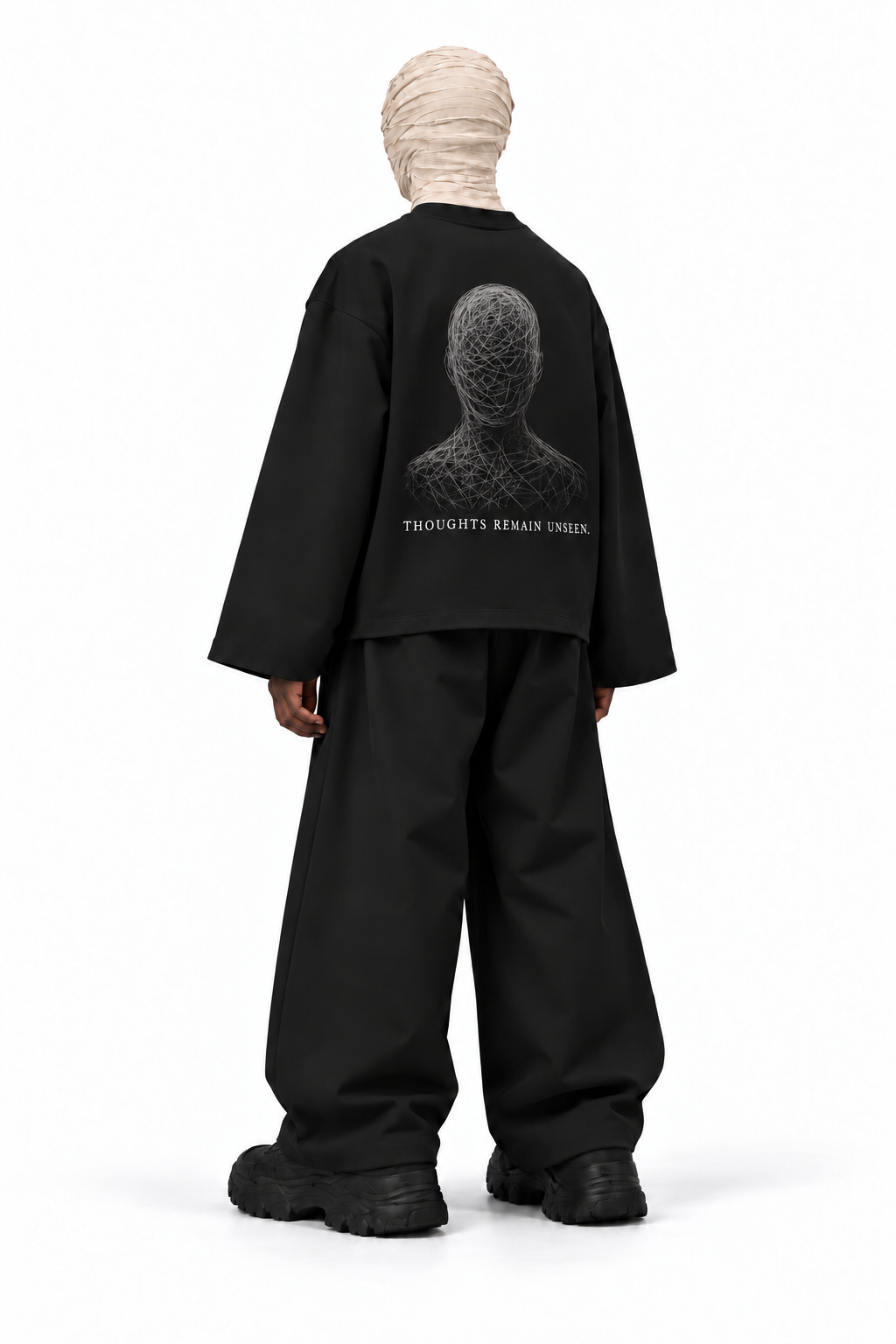 GHAYB Long Sleeve — Black — Back male model — THE STILL fine thread artwork