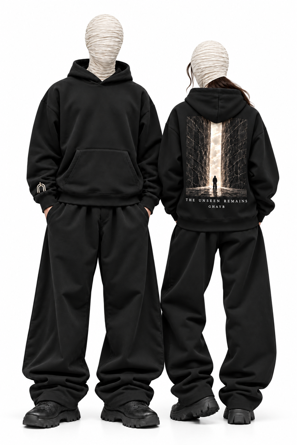 THE UNSEEN black hoodie — male and female model pair