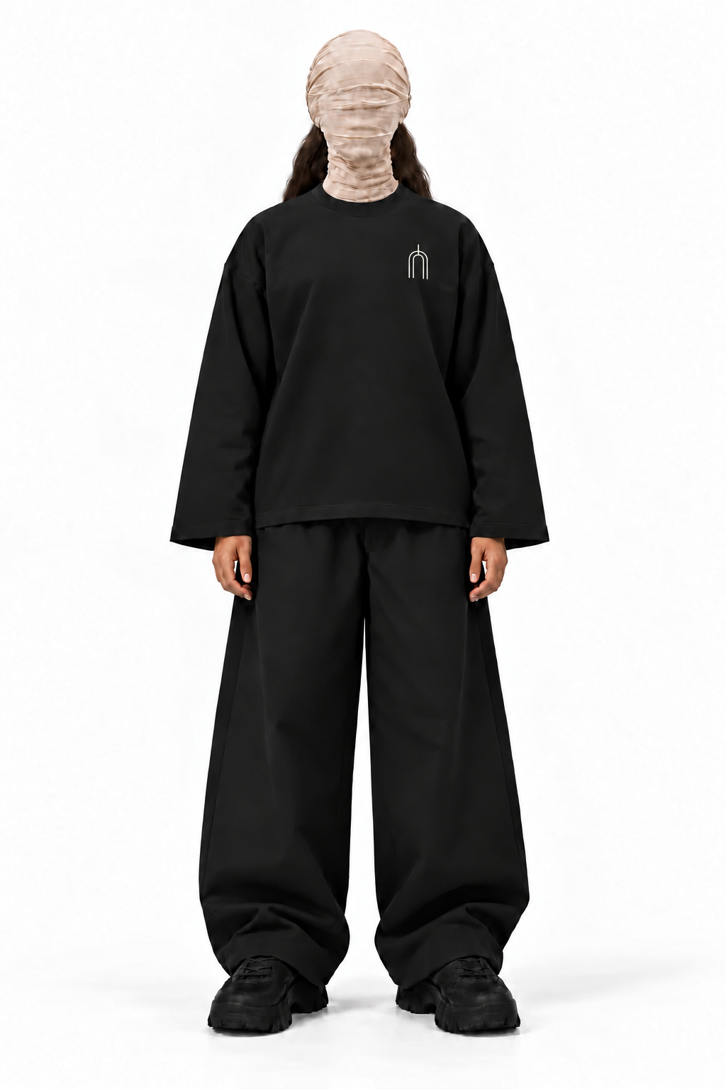 The Unseen black long sleeve — female model, transparent background
